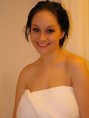 Lovely naturally busty teen taking a hot shower
